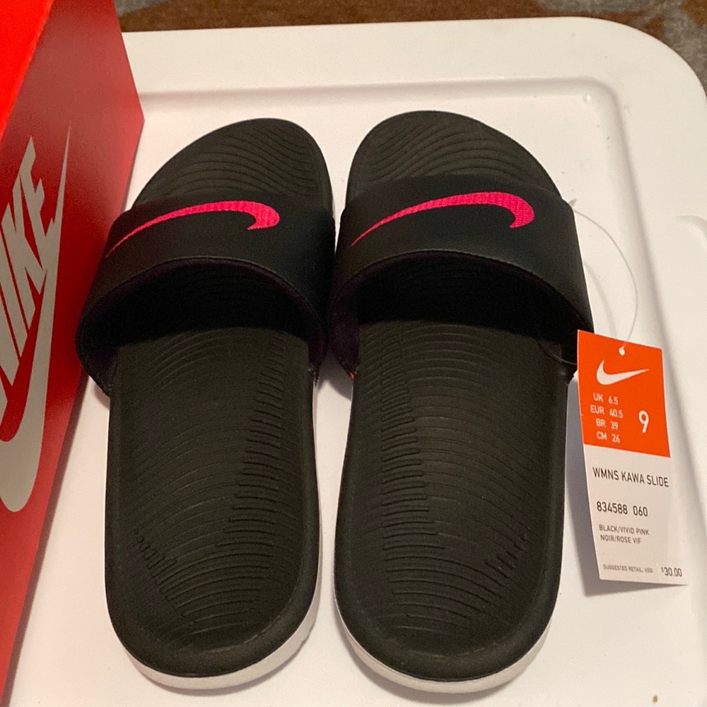Womens size 9 Nike slides black with Ted check